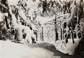 WILSON A. SNOWFLAKE BENTLEY (1865-1931) A group of four photographs, including two snowy landscapes, and two cloud studies.